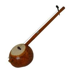 a wooden instrument with a long stick attached to it