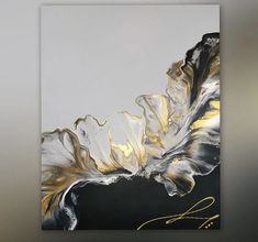 an abstract painting with black, white and gold colors on a gray background is shown