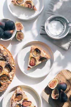 two slices of pie with figs on plates