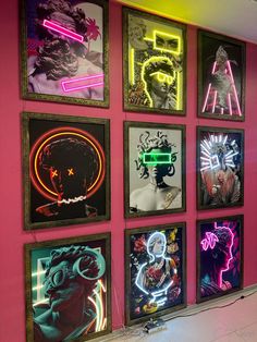 a wall with neon signs on it in a room