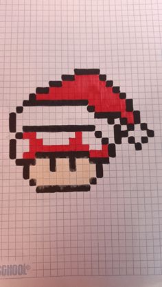 an image of a pixelated mario mushroom on paper with graph paper in the background