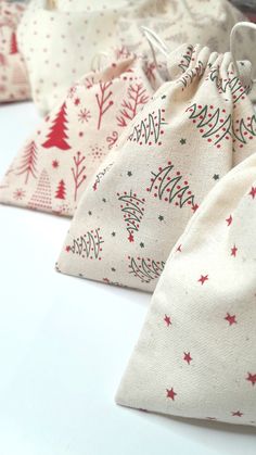 several small bags with christmas trees on them