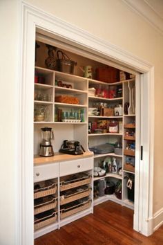 an open pantry with many items in it