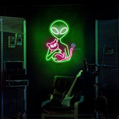 an alien sitting on top of a chair in front of a green wall with neon lights