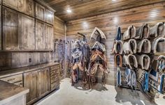 a room filled with lots of different types of saddles