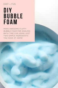 a white bowl filled with blue foam next to a pink sign that says diy bubble foam