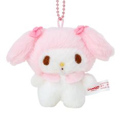 a small stuffed animal with a tag on it's neck and ears hanging from a chain