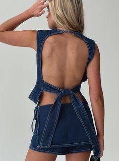 Dark wash denim top High neckline, open back with tie fastening, clasp fastening at back of neck Non-stretch material, unlined 100% cotton Cold hand wash Jeans Vest, Denim Skort, Women Y2k, Jean Vest, Y2k Clothes, Vest Fashion, Loungewear Sets, Skorts, Dark Wash Denim