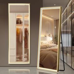 a mirror that is next to a bed in a room with a light on it