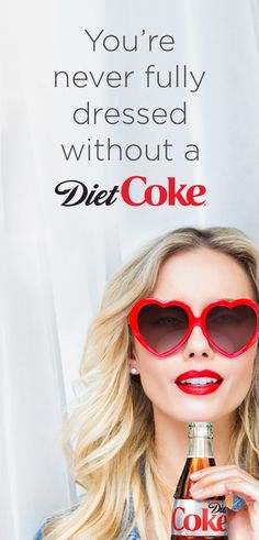 a woman wearing heart shaped sunglasses and holding a diet coke in front of her face with the caption you're never fully dressed without a diet coke