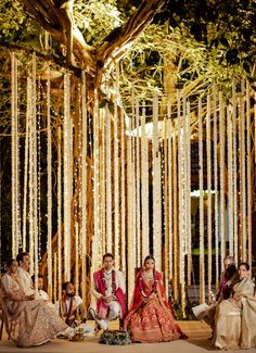 The gleaming atmosphere was incorporated with beautiful florals and bright embellishments.





#goa #wedding #weddingdesign #designer #details #florals #weddinginspiration #floraldesigner #groom #couple #bridalwear #bride #bridal #beautiful #blissful #weddingdecor #indianwedding #destinationwedding Reception Candles, Indian Wedding Deco, Minimal Wedding Decor, Hindu Wedding Decorations, Cool Flowers, Indian Wedding Decorations Receptions, Nikah Decor, Wedding Game