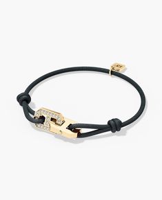 This handmade silk cord bracelet is available in both gold and platinum and is fully customizable with either natural black or white diamonds. Customize your bracelet further by choosing silk cord in a variety of colors.