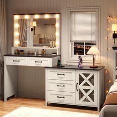 there is a vanity with lights in the room