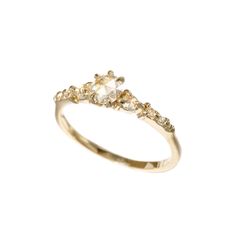 All at once delicate and intricately structured. Ancient at heart with sparkling old world rose cut diamonds. Made with beautiful, warm 14k gold and the oldest of diamond cuts, our Cyndra ring is a future heirloom. She couples flawlessly with any other bands or can shine all on her own in an ethereal, sublime glow. Dia Laurie Fleming, Colorless Diamond, Engagement Ring Wedding Band, Champagne Gold, Rose Cut Diamond, Brilliant Diamond, Round Brilliant Cut Diamond, Brilliant Cut Diamond, Rose Cut