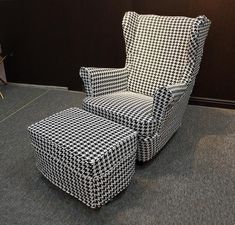 a black and white checkered chair with footstool