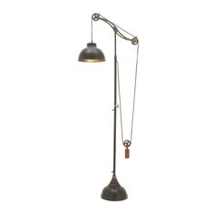 an old fashioned floor lamp with a pull chain attached to the base and a metal shade