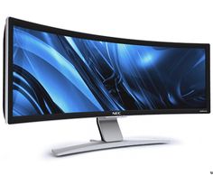 an image of a computer screen with blue and white waves on the monitor display surface