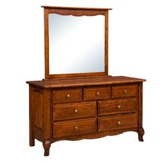 a wooden dresser with a mirror on it's top and bottom drawer, against a white background