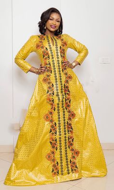 Description: This magnificent custom African dress is perfect for any occasion you want to look your best. It includes 3 pieces (Full dress, wrap-around or Skirt and head-tie).   Important Note: For broderie mix with bazin and garniture mix clothes only: Depending on the availability of the( fabric) / Garnitures (TRIMS) may be different than the one in the pictured. However, the dress will be sewn exactly in the style and colors shown. You can always request to see the fabrics or trims before we Elegant Yellow Kaftan For Festive Occasions, Traditional Long Sleeve Yellow Gown, Elegant Long Sleeve Yellow Gown, Elegant Yellow Dress For Celebration, Traditional Gold Dresses For Celebration, Traditional Gold Dress For Party, Yellow Evening Kaftan, Traditional Yellow Maxi Dress For Party, Yellow Long Sleeve Party Gown