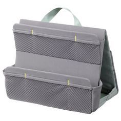 the back side of a gray bag with two compartments on each side and yellow handles