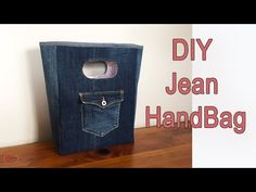 a bag made out of jeans with the words diy jean handbag on it