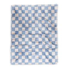 a blue and white checkered blanket on a white background