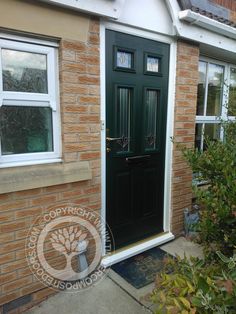 a black front door on a brick house