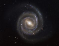 an image of a spiral shaped object in the sky