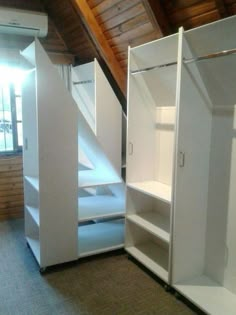 there are two white closets next to each other in the room with carpeted flooring