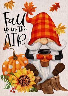 a painting of a gnome with autumn leaves on it's head and the words fall is in the air