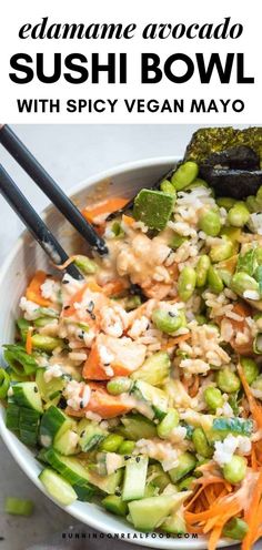 a bowl filled with rice and vegetables next to chopsticks