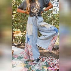 A perfect blend of boho comfort, the Coastal Chill Wide Leg Pants will elevate your wardrobe, offering both style and effortless ease! Comfortable Cotton fabric with unique mix of plaid, floral and star patchwork Loose and wide leg pant silhouette Classic elastic drawstring waistline Convenient and so cute contrast plaid back patch pockets Raw edges and raw details throughout for added boho style Pair with: Evermore Seamless Lace Racerback Bralette, On The Go V Neck Ribbed Essential Tee and Ethereal Earth Stretch Bracelet. *Due to lighting and differences in monitors, actual colors may vary slightly from what appears online. Model is 5'8" and wearing a size Small. Approximate measurements are as follows: SMALL: Waist: 26", Stretched Waist: 30", Hip: 50", Rise: 12", Length: 40 1/2", Inseam: Cola Aesthetic, Star Patchwork, Boho Essentials, Bralette Outfit, Cherry Cola, Wide Leg Pant, Bird Nest, Bottom Clothes, New Tops