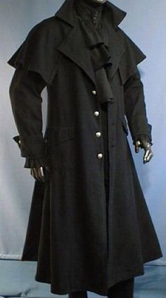 box coat made of rough cotton 	 no lining 	 big tippet on the shoulders 	 slit in the back 	  this coat runs very small, please order at least one… Larp Fashion, Black Trench Coat, Cool Coats, Larp Costume, Medieval Clothing, Gothic Outfits, Fantasy Clothing, Steampunk Fashion, Fantasy Fashion