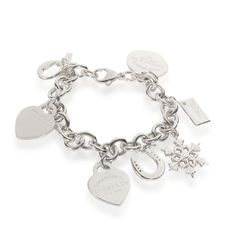 Tiffany & Co. Heart Tag Snowflake Charm Bracelet In Sterling Silver Silver / Bracelet Tiffany &Amp; Co. Tiffany Charm Bracelets, Tiffany Bracelet Silver, Tiffany And Co Jewelry, Heart Tag, Toggle Bracelet, Silver Charm Bracelet, Tiffany And Co, Tiffany Heart, Heart Charm Bracelet