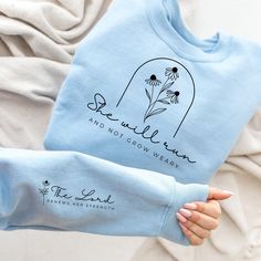 She Will Run and Not Grow Weary Sweatshirt, Isaiah 40:31, Bible Sweatshirt, Jesus Apparel, Christian Gift, Faith,Boho Scriptures,Wildflower  🌟 WELCOME TO MODE PARAGON! 🌟 🤗 Are you in search of delightful, personalized, and cozy outfits for your loved ones? You're in the right place! 🌈✨ At Mode Paragon, we prioritize customer service and are here to assist you every step of the way. If you have any questions, don't hesitate to reach out - we're always ready to respond promptly! 💖 🛍️ ORDERIN Grow In Grace Shirt, Yahweh Sweatshirt, Jireh You Are Enough Shirt, Jireh T Shirt, Faith Based Sweatshirts, Isaiah 40 31, Toddler Hoodie, American Made, Christian Gifts