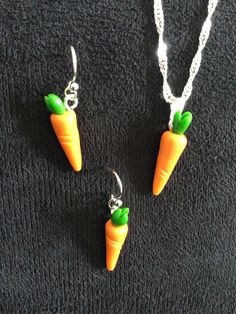 (14,017) Carrot Necklace or Earrings  Polymer Clay, about 1" x 1/4" Earrings on silver plate ear wires  Necklace on 18" sterling silver chain Sterling Silver Pierced Round Pendant Jewelry, Sterling Silver Hypoallergenic Pendant Earrings, Sterling Silver Necklace With Matching Earrings As Gift, Orange Earring Jewelry Gift, Dangling Carrot, Hypoallergenic Orange Sterling Silver Jewelry, Orange Hypoallergenic Sterling Silver Jewelry, Cadmium-free Sterling Silver Round Pendant Jewelry, Orange Sterling Silver Round Jewelry