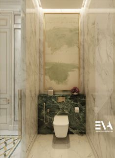 a bathroom with marble walls and flooring in the shower area, along with a painting on the wall