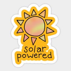 a yellow sticker with the words solar powered in black lettering on it's side