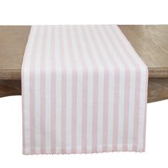 a pink and white striped table runner