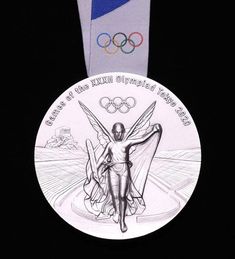 the olympic medal is displayed on a black background