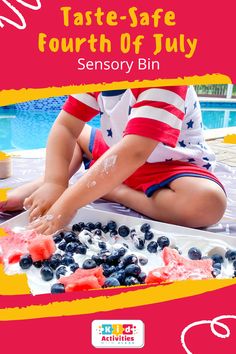 a child is sitting on the ground with blueberries and watermelon