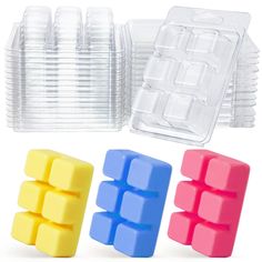 three ice cubes are shown next to each other in front of a plastic container