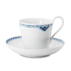 a white cup and saucer with blue trimmings on the rim, sitting next to each other