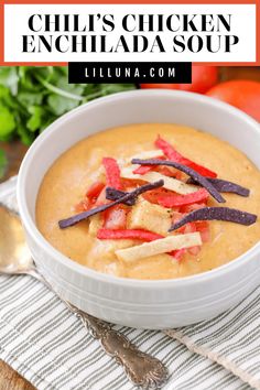 a white bowl filled with chili chicken enchilada soup