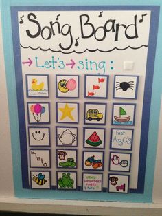 a poster on the wall that says song board let's sing with pictures and words