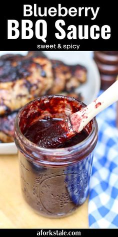 blueberry bbq sauce in a mason jar with chicken on the side and text overlay