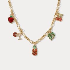 This Summer Fruit Necklace offers a exquisite blend of classic style and contemporary flair. Boasting glamorous strawberry, cherry, and pineapple charms on a palm leaf charm and colorful cocktail charm, this elegant necklace is the perfect way to make an exquisitely tasteful statement. DETAILS Plating: 18K Gold Materials: 18K Gold on Brass, Cubic Zirconia Measurements: Length: 16.93"(43cm) + Extender: 1.97"(8.0cm) Weight: 14.32g Trendy Fruit Design Jewelry For Party, Elegant Dangle Jewelry With Fruit Design, Elegant Fruit Design Dangle Jewelry, Trendy Gold Jewelry With Fruit Design, Gold Necklace For Wedding, Fruit Bracelet, Fruit Necklace, Fruits Images, Fruit Jewelry