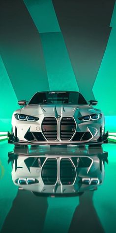 the bmw concept car is shown in front of a green and black background with its hood up