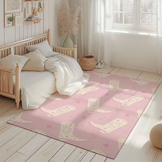 a bed room with a neatly made bed and a pink rug in front of a window