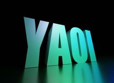 the word yahoo spelled out in green and blue light on a black background with reflections